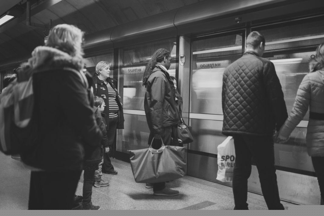 People Waiting at Train Station